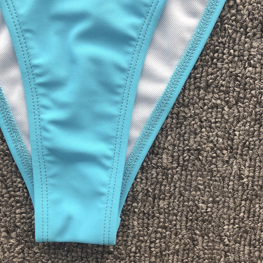 Turquoise triangle bikini with gold-toned rhinestone chain halter straps and matching charm-embellished waistline. - Image 17