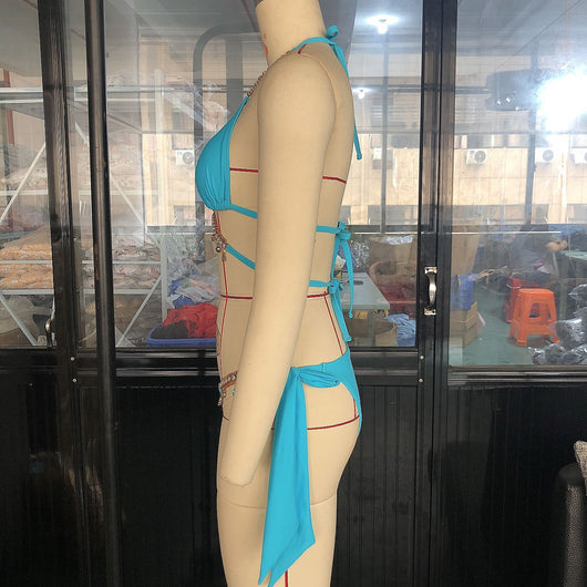 Turquoise triangle bikini with gold-toned rhinestone chain halter straps and matching charm-embellished waistline. - Image 19