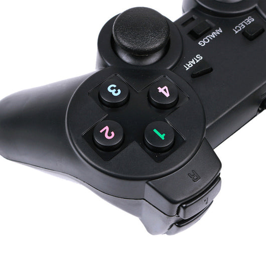 Black USB wired gamepad controller with a D-pad, dual analog sticks, and four colored action buttons. - Image 9