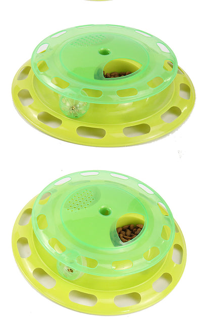 Green and yellow two-tier interactive cat toy turntable with a bell ball in the track and kibble in the top compartment. - Image 6