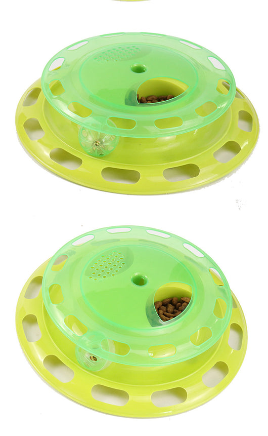 Green and yellow two-tier interactive cat toy turntable with a bell ball in the track and kibble in the top compartment. - Image 6