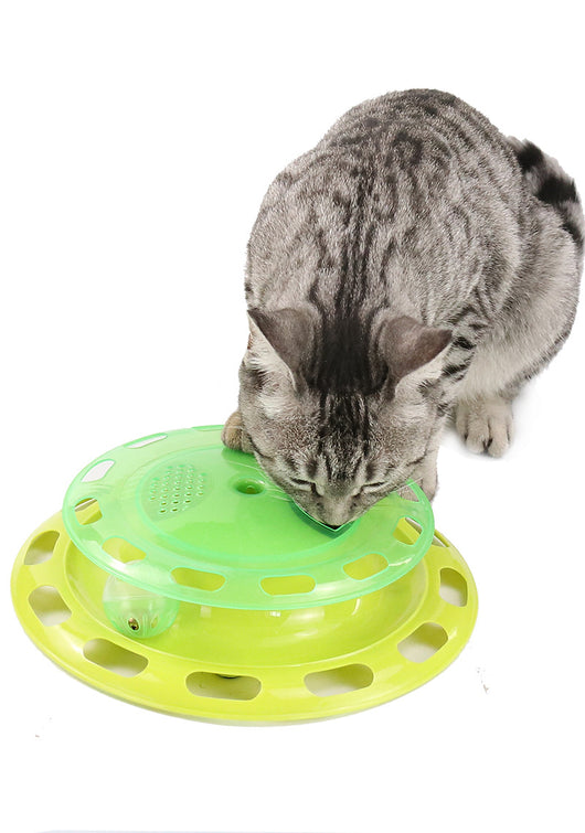 Green and yellow two-tier interactive cat toy turntable with a bell ball in the track and kibble in the top compartment. - Image 8