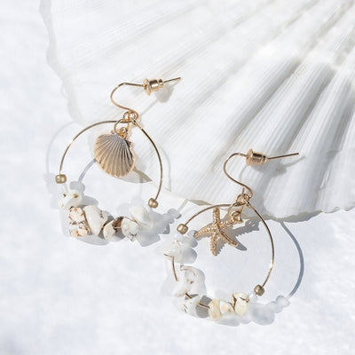 Aretes Estrella de Cinco Puntas en Metal Salvaje con Concha Marina - Image 12