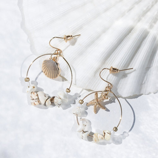 Aretes Estrella de Cinco Puntas en Metal Salvaje con Concha Marina - Image 12