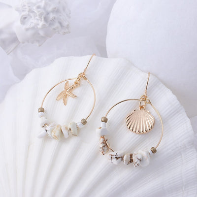 Aretes Estrella de Cinco Puntas en Metal Salvaje con Concha Marina - Image 13