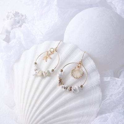 Aretes Estrella de Cinco Puntas en Metal Salvaje con Concha Marina - Image 14