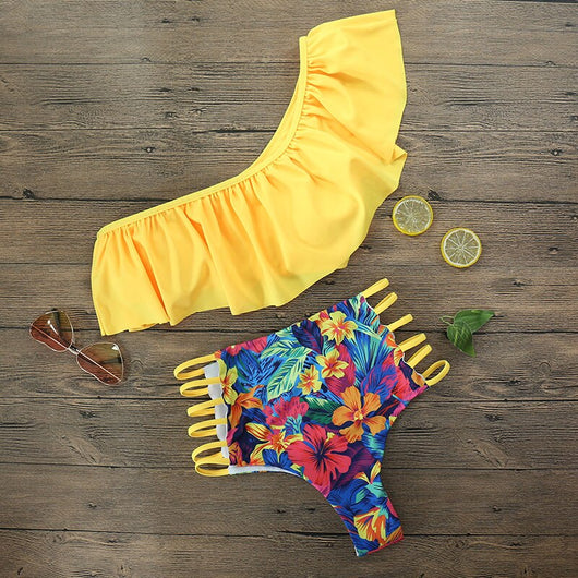 Vibrant one-shoulder ruffle print swimsuit with a lace-up top and high-waisted ruched bottoms, featuring a tropical floral pattern. - Image 8