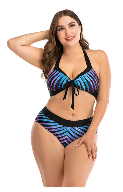 Plus size two-piece swimsuit with a black base, colorful geometric pattern, criss-cross top, and high-waisted bottom. - Image 8