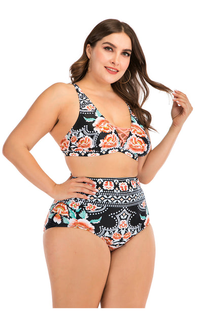 Plus size two-piece swimsuit with a black base, colorful geometric pattern, criss-cross top, and high-waisted bottom. - Image 18