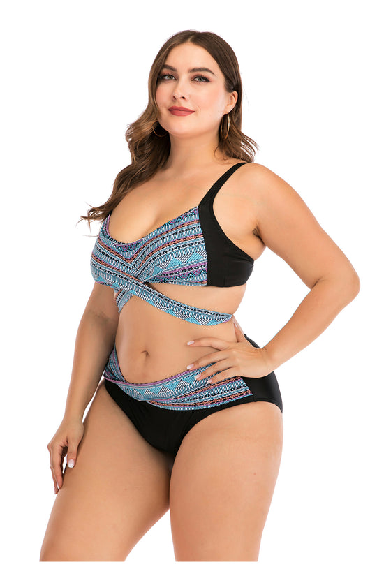 Plus size two-piece swimsuit with a black base, colorful geometric pattern, criss-cross top, and high-waisted bottom. - Image 26