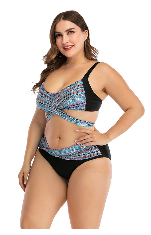 Plus size two-piece swimsuit with a black base, colorful geometric pattern, criss-cross top, and high-waisted bottom. - Image 30