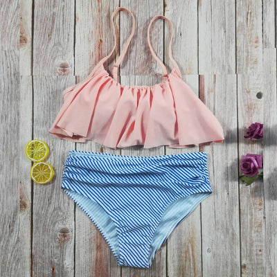 Navy blue ruffled tube top swimsuit with high-waisted bottoms featuring a white geometric pattern. - Image 21