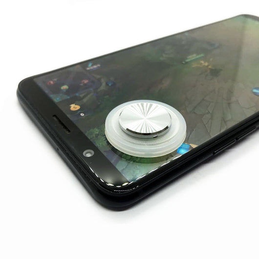 Pink and silver mobile game joystick attached to a black smartphone displaying a game on its screen. - Image 3