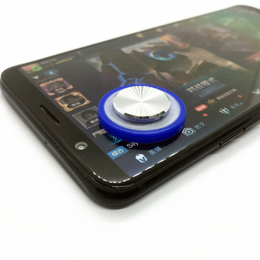 Pink and silver mobile game joystick attached to a black smartphone displaying a game on its screen. - Image 5