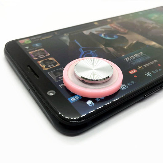 Pink and silver mobile game joystick attached to a black smartphone displaying a game on its screen. - Image 8