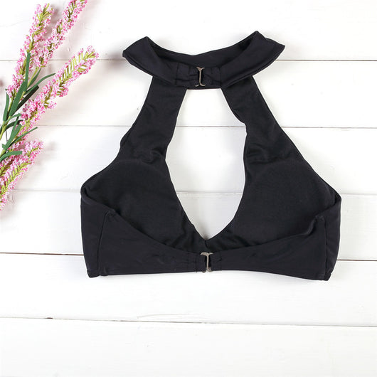 Black two-piece bikini with a high-neck halter top featuring a deep V-neck and matching classic bikini bottoms. - Image 10