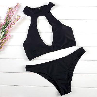 Black two-piece bikini with a high-neck halter top featuring a deep V-neck and matching classic bikini bottoms. - Image 11
