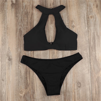 Black two-piece bikini with a high-neck halter top featuring a deep V-neck and matching classic bikini bottoms. - Image 12