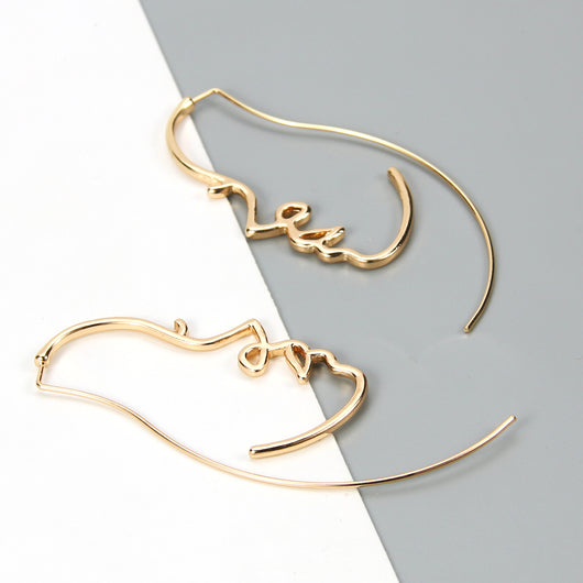 Aretes Artísticos de Silueta Facial - Estilo y Personalidad - Image 10