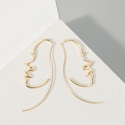 Aretes Artísticos de Silueta Facial - Estilo y Personalidad - Image 11
