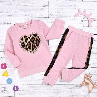 Suéter Bicolor Estampado Leopardo con Detalles de Cuentas - Image 8