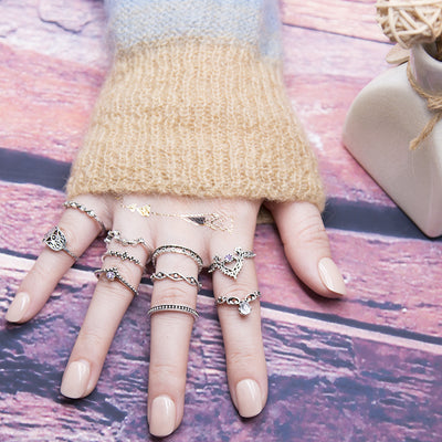 Juego de 10 Anillos de Diamante Púrpura con Diseño Hueco Retorcido y Corona - Image 9