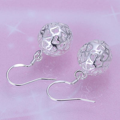 Aretes de Corazón Hueco - Image 8