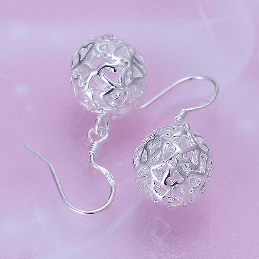 Aretes de Corazón Hueco - Image 9
