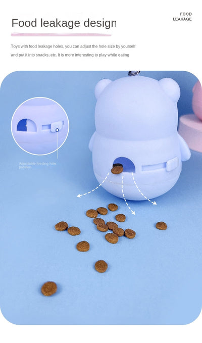 Light blue panda tumbler pet toy with a spring-attached feather and bell, designed to dispense treats. - Image 12