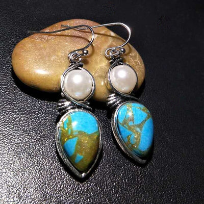 Aretes étnicos vintage con piedra azul en forma de gota - Image 9