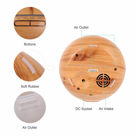 Wood grain ultrasonic aromatherapy diffuser and humidifier with a glowing blue LED light band and control buttons. - Image 16