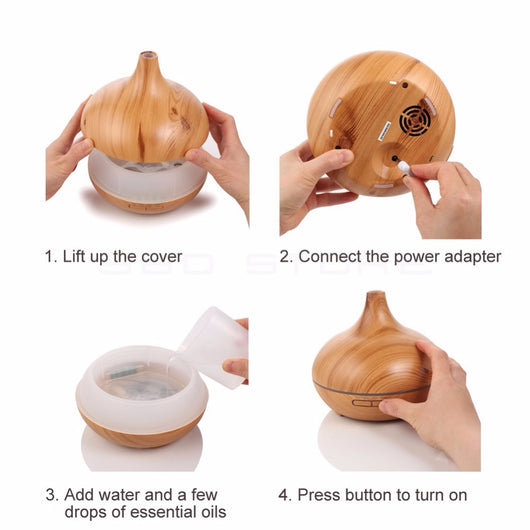 Wood grain ultrasonic aromatherapy diffuser and humidifier with a glowing blue LED light band and control buttons. - Image 15