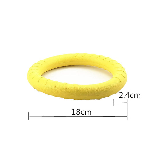 Bright yellow EVA pet ball dog toy with textured grooves and paw print details for interactive play. - Image 25