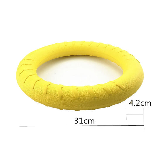 Bright yellow EVA pet ball dog toy with textured grooves and paw print details for interactive play. - Image 26