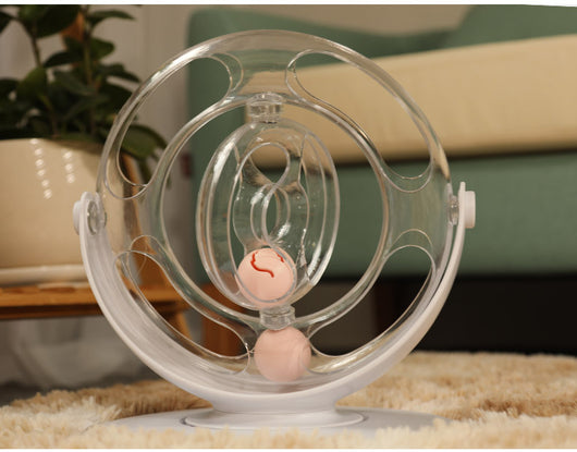 Clear plastic cat turntable toy with two pink balls inside, designed for interactive play and entertainment. - Image 13