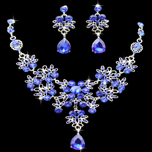 Purple crystal necklace and earring set with butterfly and floral designs, featuring large teardrop pendants. - Image 10