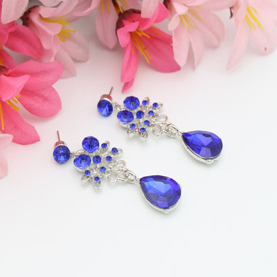 Purple crystal necklace and earring set with butterfly and floral designs, featuring large teardrop pendants. - Image 11