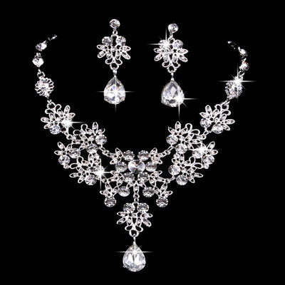 Purple crystal necklace and earring set with butterfly and floral designs, featuring large teardrop pendants. - Image 14