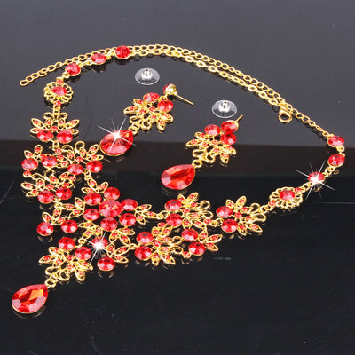 Purple crystal necklace and earring set with butterfly and floral designs, featuring large teardrop pendants. - Image 18