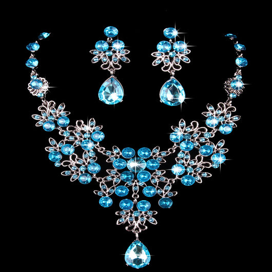Purple crystal necklace and earring set with butterfly and floral designs, featuring large teardrop pendants. - Image 20