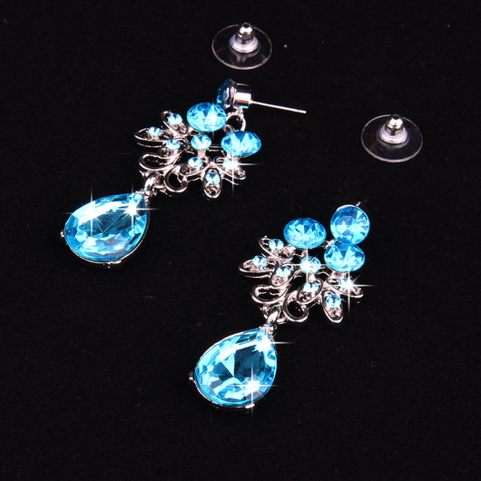 Purple crystal necklace and earring set with butterfly and floral designs, featuring large teardrop pendants. - Image 24