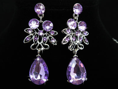 Purple crystal necklace and earring set with butterfly and floral designs, featuring large teardrop pendants. - Image 26