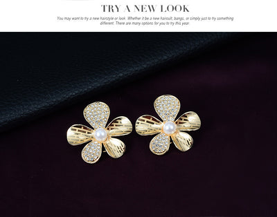 Gold-tone four-piece jewelry set with flower motifs, featuring a necklace, bracelet, ring, and earrings, all with faux pearls and clear rhinestones. - Image 15