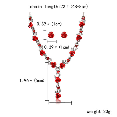 Red rose alloy necklace and stud earrings set with silver-tone chain and clear accents, displayed on a black bust. - Image 4