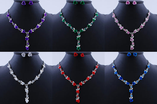 Red rose alloy necklace and stud earrings set with silver-tone chain and clear accents, displayed on a black bust. - Image 5
