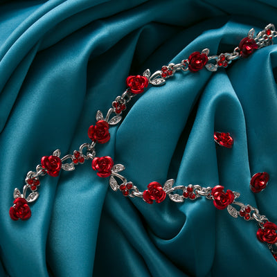 Red rose alloy necklace and stud earrings set with silver-tone chain and clear accents, displayed on a black bust. - Image 8