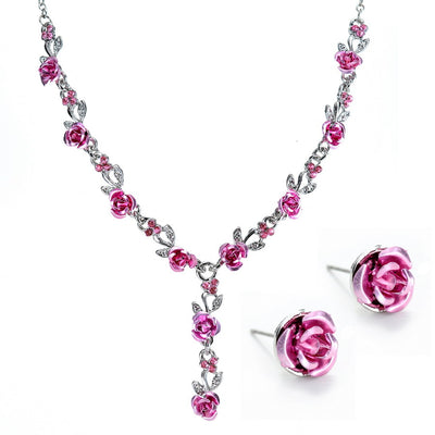 Red rose alloy necklace and stud earrings set with silver-tone chain and clear accents, displayed on a black bust. - Image 10