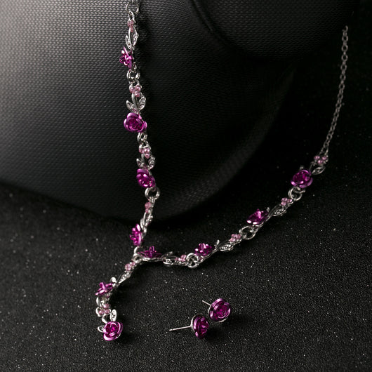 Red rose alloy necklace and stud earrings set with silver-tone chain and clear accents, displayed on a black bust. - Image 13