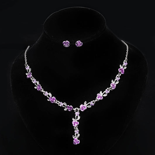 Red rose alloy necklace and stud earrings set with silver-tone chain and clear accents, displayed on a black bust. - Image 18