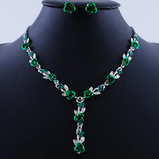Red rose alloy necklace and stud earrings set with silver-tone chain and clear accents, displayed on a black bust. - Image 19